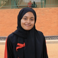 Mariem Agabani, a Sudanese refugee and medical student, continues her studies at Sudan International University, hosted by the Islamic University in Uganda. She fled Khartoum with her family in 2023 and is now gaining hands-on experience at Mulago National Referral Hospital.