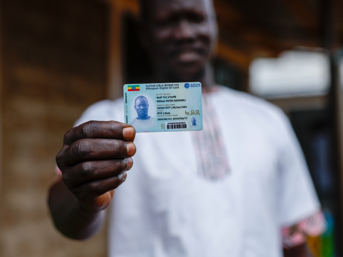 Refugee receives a Fayda number and ID document in Ethiopia.